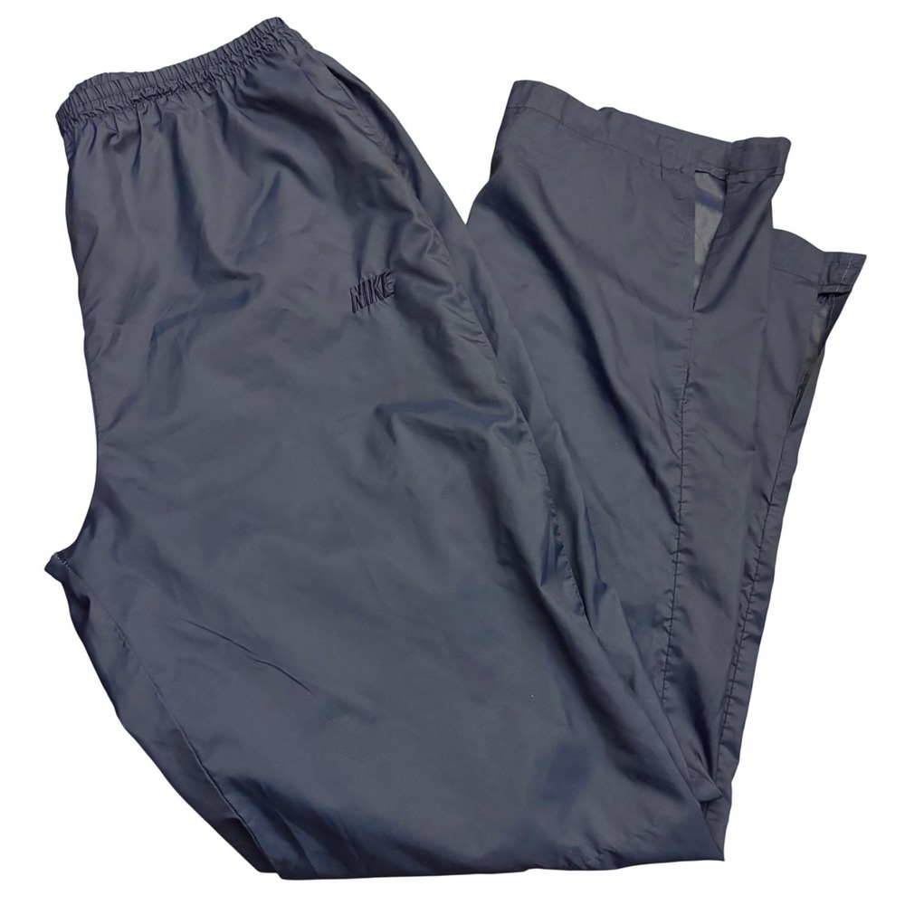 Vintage Nike | Mens L Navy Blue Nylon Windbreaker Track‎ Pants | 90s | cuff slit